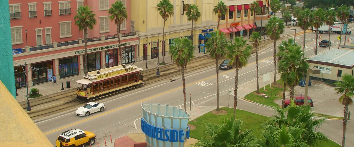 View along Channelside Drive in Tampa's Channel District, with a TECO streetcar visible.